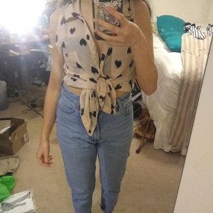 Sleeveless button down blouse